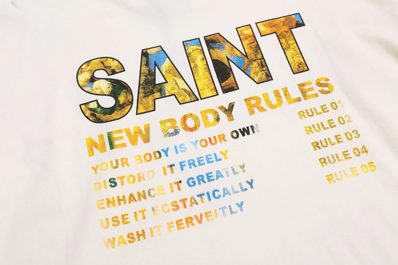 SAINT Michael FW25 vintage distressed round neck long-sleeved T-shirt with oil painting letters printed on the chest for spring and autumn. Fabric: 260g Style number: SM663 Size: S-M-L-XL Color: White Price: P144
